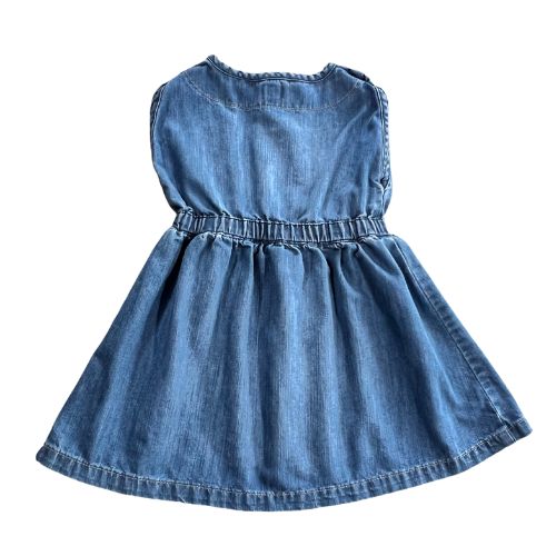 Pre-Owned Old Navy Sleeveless Denim Dress Size: Toddler girl 3T Color: Blue Jean Features: Sleeveless Elastic Waist Decorative front tie Front top buttons Material: 85% Cotton, 15% Polyester Condition: Well-Loved, minor discoloration of front right shoulder Measurements: Chest: 20.5" Hem: 46" Length: 20.25" Used - Our Families Attic