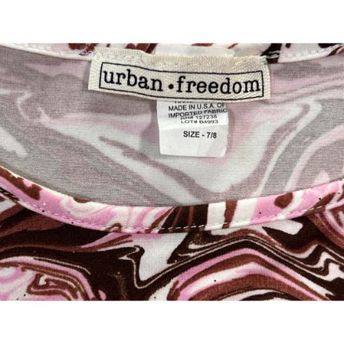 Pre-Owned Urban Freedom Marble Cap Sleeve Blouse $8.00 (Est. Retail Price $22.00) Size: Big Girls 7-8 Color: Multi-colored Neopolitan Colors Marble design Features: Cap Sleeve Scoop neck Faux Layer look Tie front Material: 96% Polyester 4% Spandex Condition: Good Gently Used Measurements: Chest: 27" Waist: 26.5" Sleeve: 4" Bottom Hem: 27" Body length: 17" tag - Our Families Attic