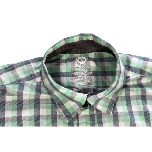 Wonder Nation Green & Gray Short Sleeve Button-Up Dress Shirt Size: Big Boy's Size XXL 18 Color: Light green & gray checkered Contrast gray inside collar and behind buttons Features: Short sleeve Button-up Collar Front pocket Material: Body: 66% cotton, 31% polyester, 3% spandex Contrast collar & buttons: 100% cotton Condition: Gently Used - a stain on the upper right back Used - Our Families Attic